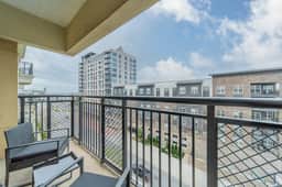 Modern 4BR with Balcony and City Skyline Views - Image 2